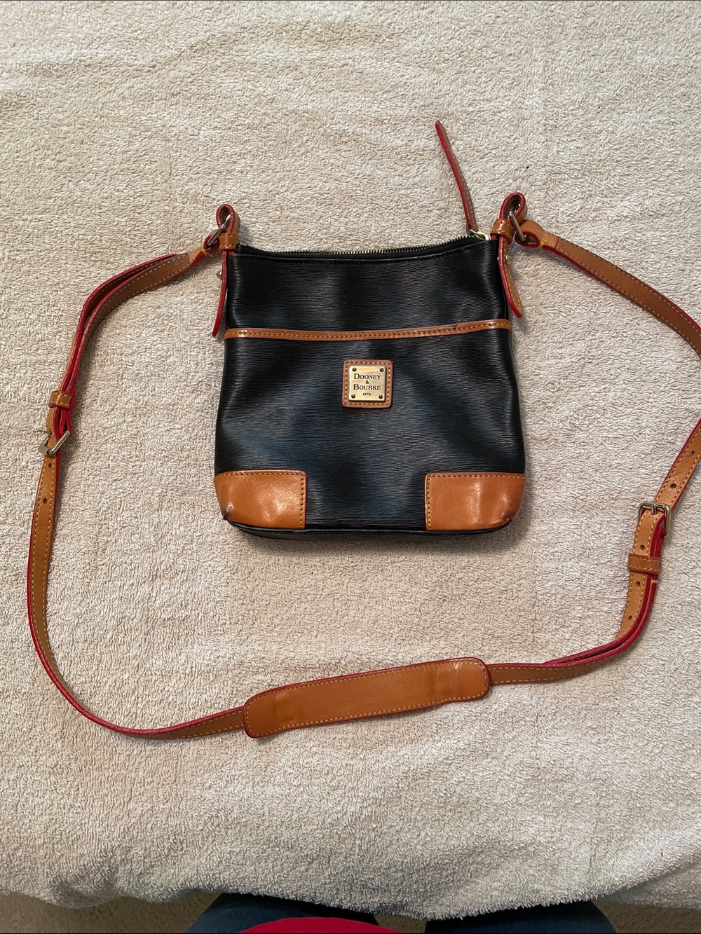 Dooney & Bourke Black Leather Crossbody with Tan Trim and Red Strap Accents